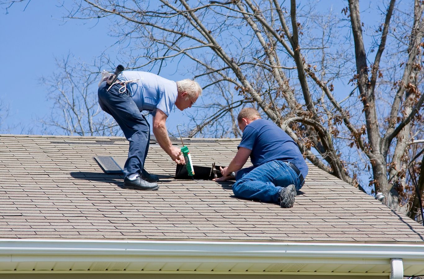 Relax Roofing inspector carefully examining a roof for potential issues in St. Tammany Parish to prevent costly repairs.