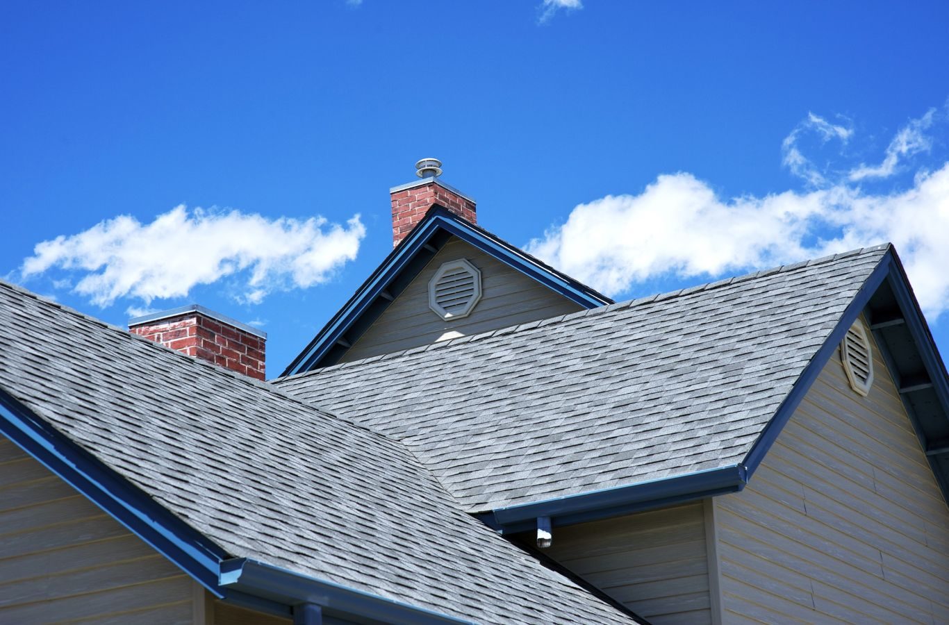 A Relax Roofing employee installing shingles on a residential roof in St. Tammany Parish, ensuring top-quality workmanship.