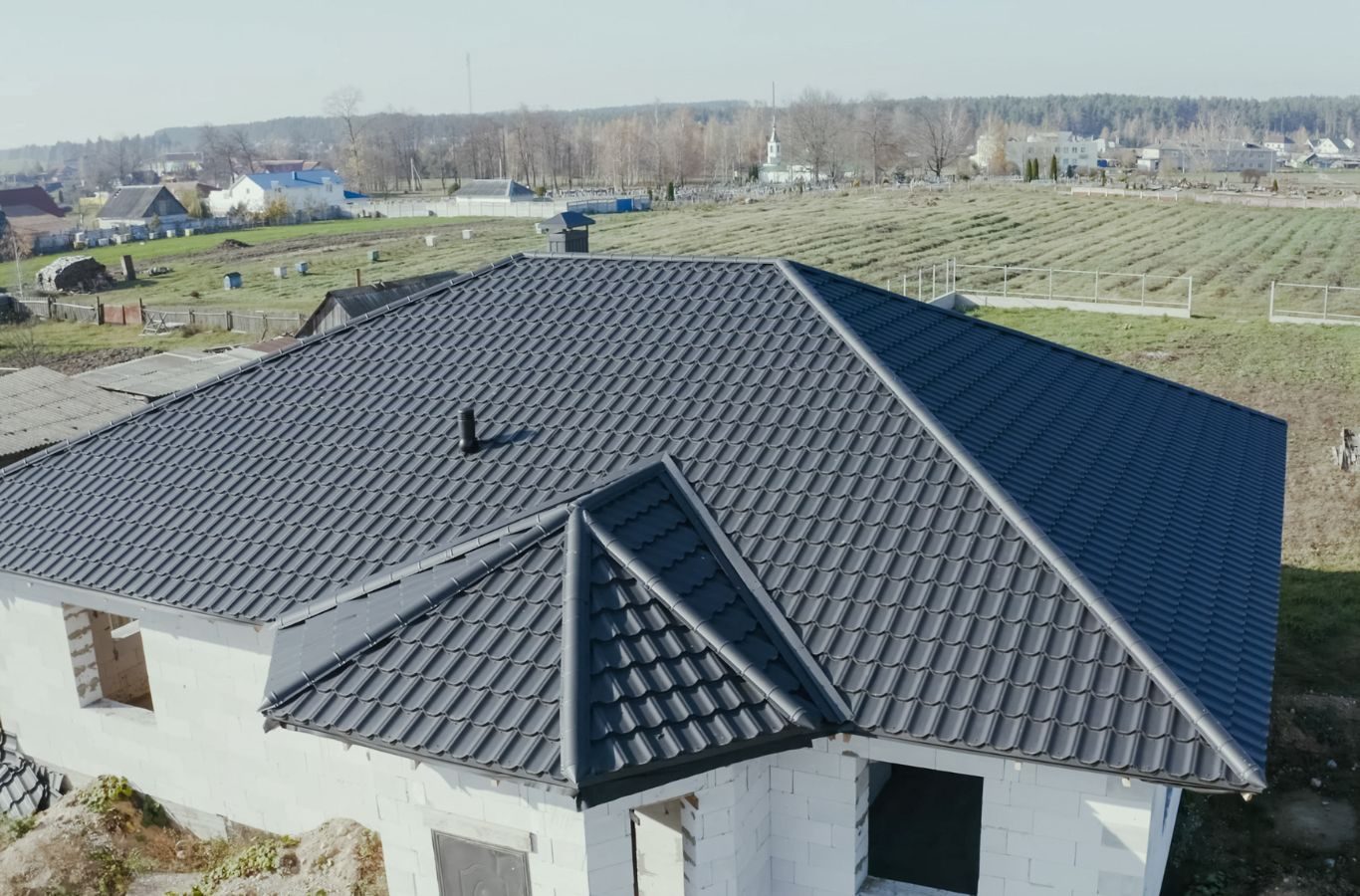 A professional roofer from Relax Roofing installing new roofing materials in St. Tammany Parish, ensuring high-quality service. Residential roofing near me.