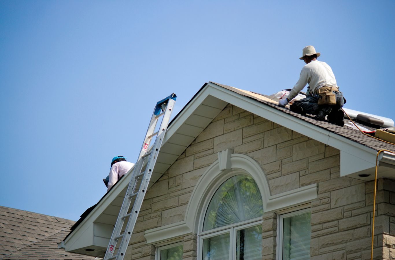 A roof inspector from Relax Roofing assessing a roof for damage in St. Tammany Parish. Roof inspection near me.